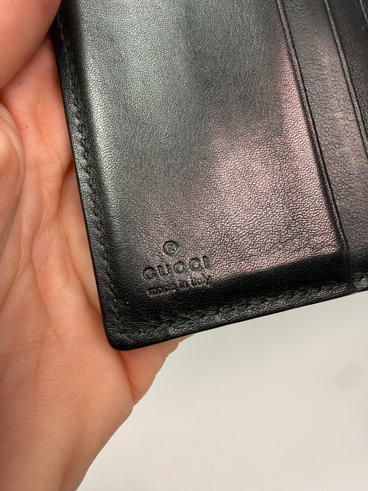 Gucci Guccissima Black Leather Unisex Trifold Wallet